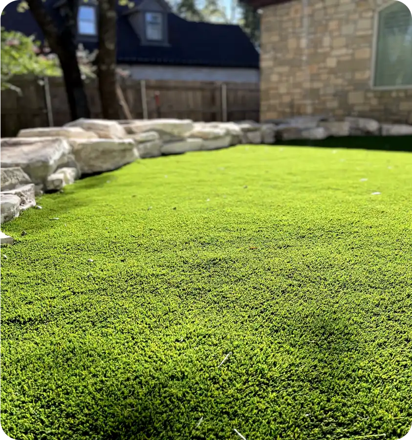 Artificial turf installed by J&L Hardscapes at an Austin home.