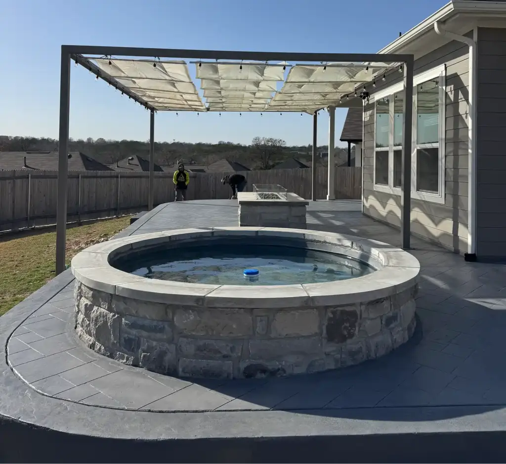 Hardscape 10 Outdoor Living Space Ideas Worth Stealing for Your Austin Backyard 4 A small backyard with a retractable pergola for shade during sunny Austin days